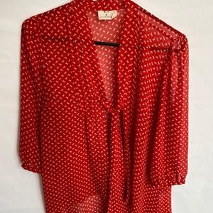 Anthropologie “Pins and Needles” red blouse.